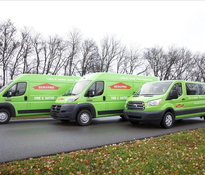 Different servpro vehicles in a row