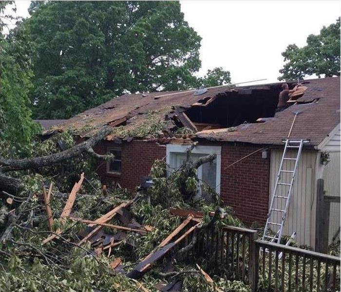 Hole on a roof, home destroyed by a storm