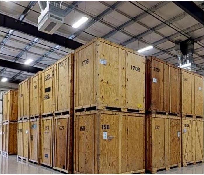 Large storage containers in a warehouse